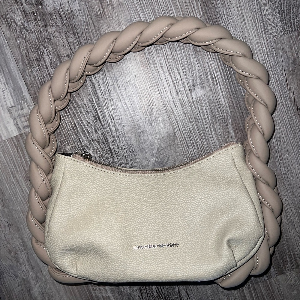 Manière de Voir knotted shoulder purse